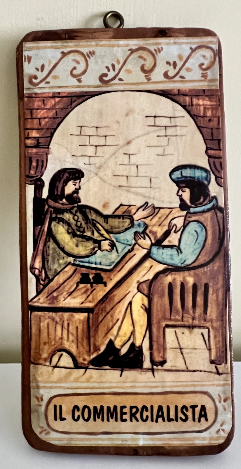 Placca in ceramica tradizionale dello Studio Bondavalli raffigurante Il Commercialista